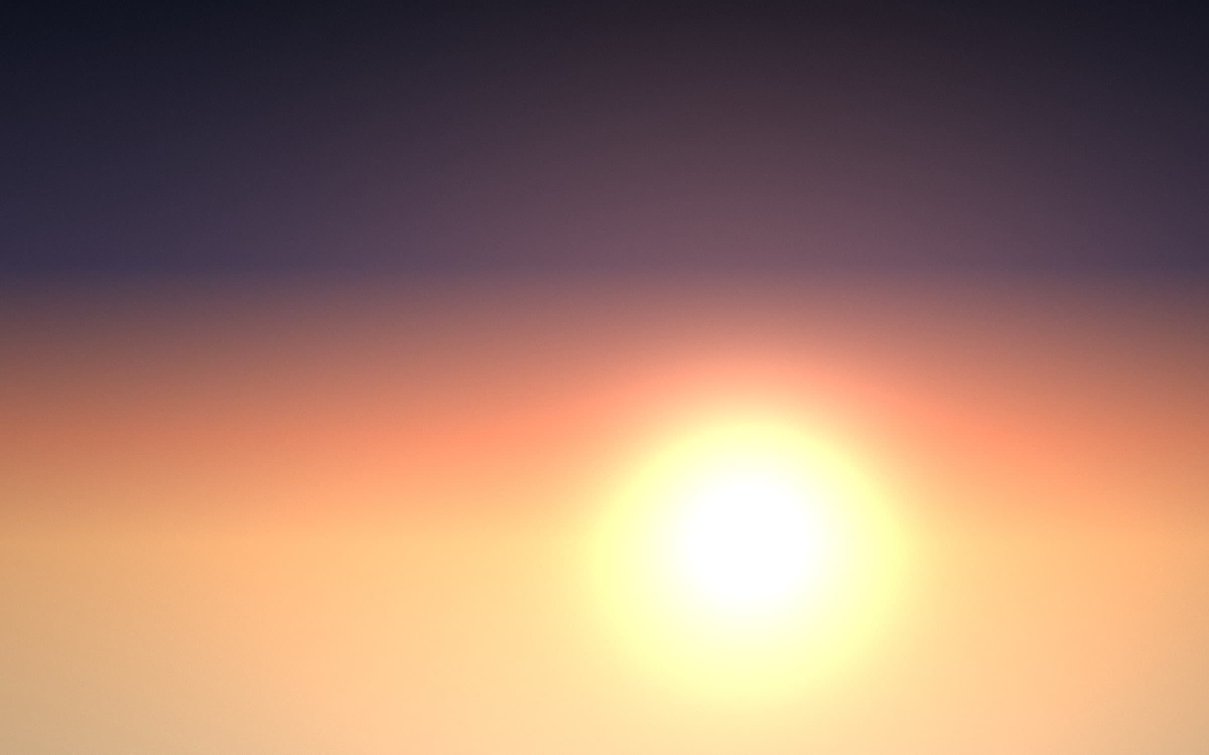 Last light over layered mountain ridges