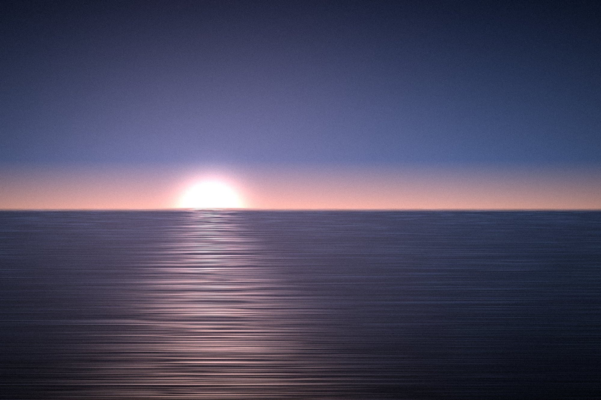 Sun setting on an open ocean horizon